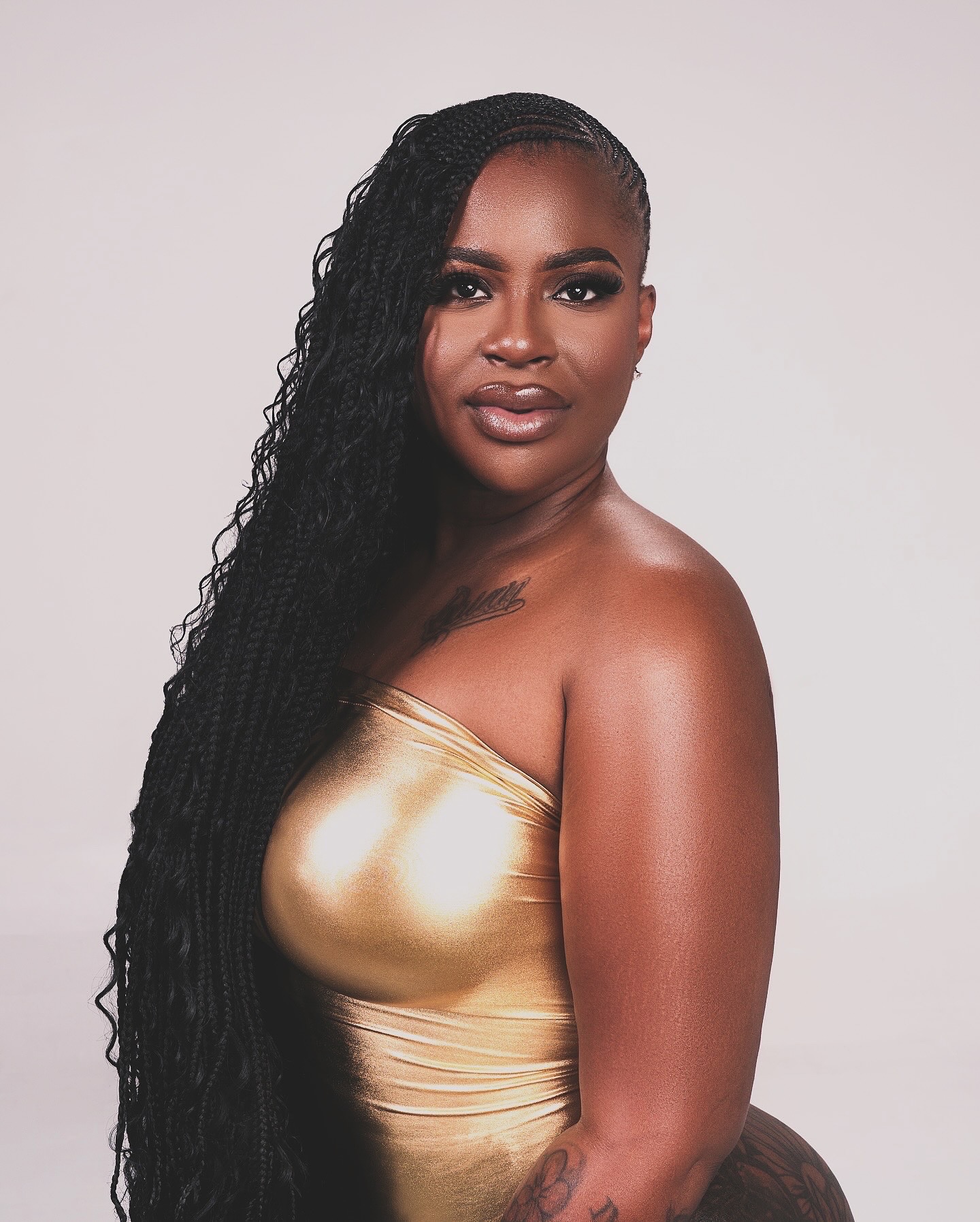 Aminah — feature client portrait with knotless braids